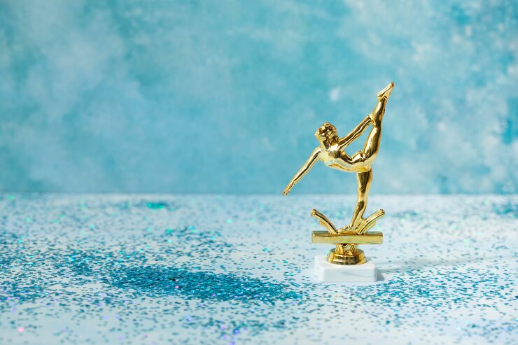 Foto grátis conceito de vencedor com prêmio de bailarina