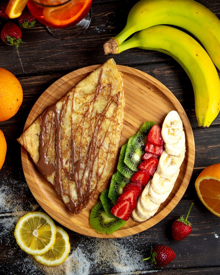 Foto grátis crepe de chocolate com frutas frescas