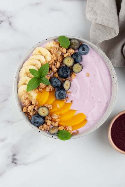 Foto grátis deliciosa variedade de tigela de açaí doce