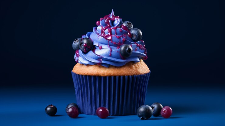 Foto grátis delicioso cupcake com frutas vermelhas