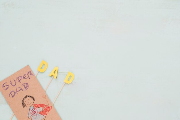Desenho e papai escrevendo