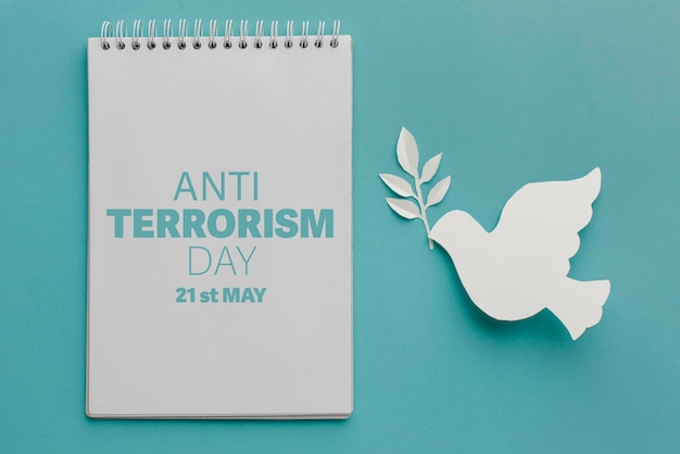 Foto grátis dia anti terrorismo com pomba de papel