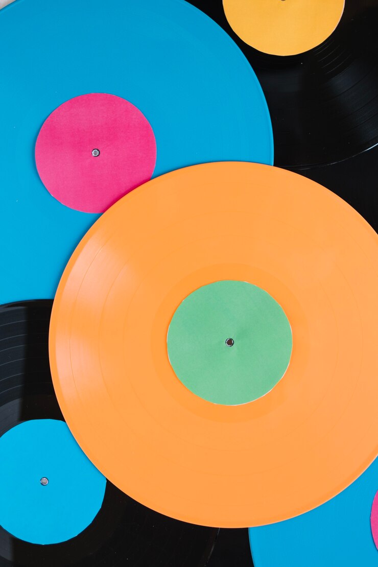 Foto grátis discos de vinil colorido de close-up