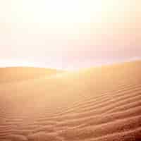 Foto grátis dunas de areia e céu no deserto.