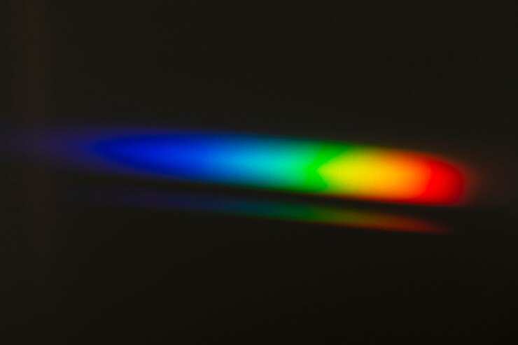 Foto grátis efeito de fuga de luz em um papel de parede de fundo preto