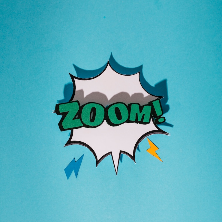 Foto grátis efeito de som de explosão com zoom balão de texto contra o fundo azul