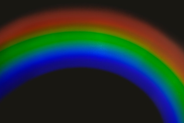 Foto grátis efeito de vazamento de luz de semicírculo em papel de parede preto