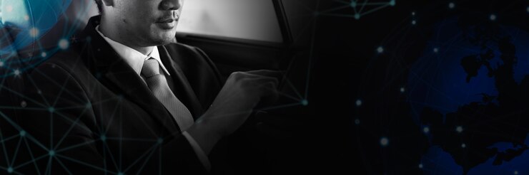Foto grátis empresário asiático sentado em um carro