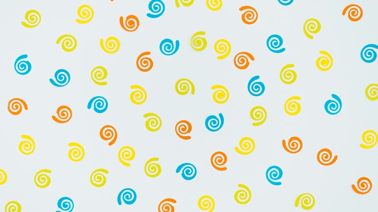 Foto grátis enfeites de aniversário colorido sobre fundo branco
