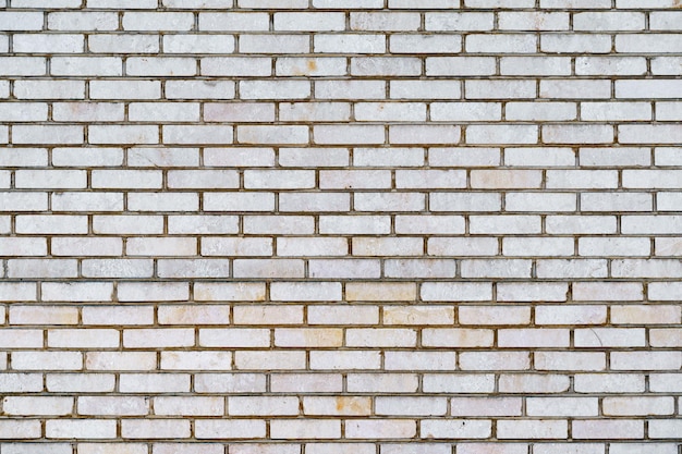 Espaço de cópia de fundo branco de parede de tijolo velho