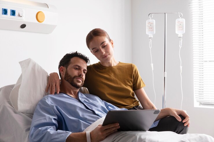 Foto grátis esposa visitando seu marido doente