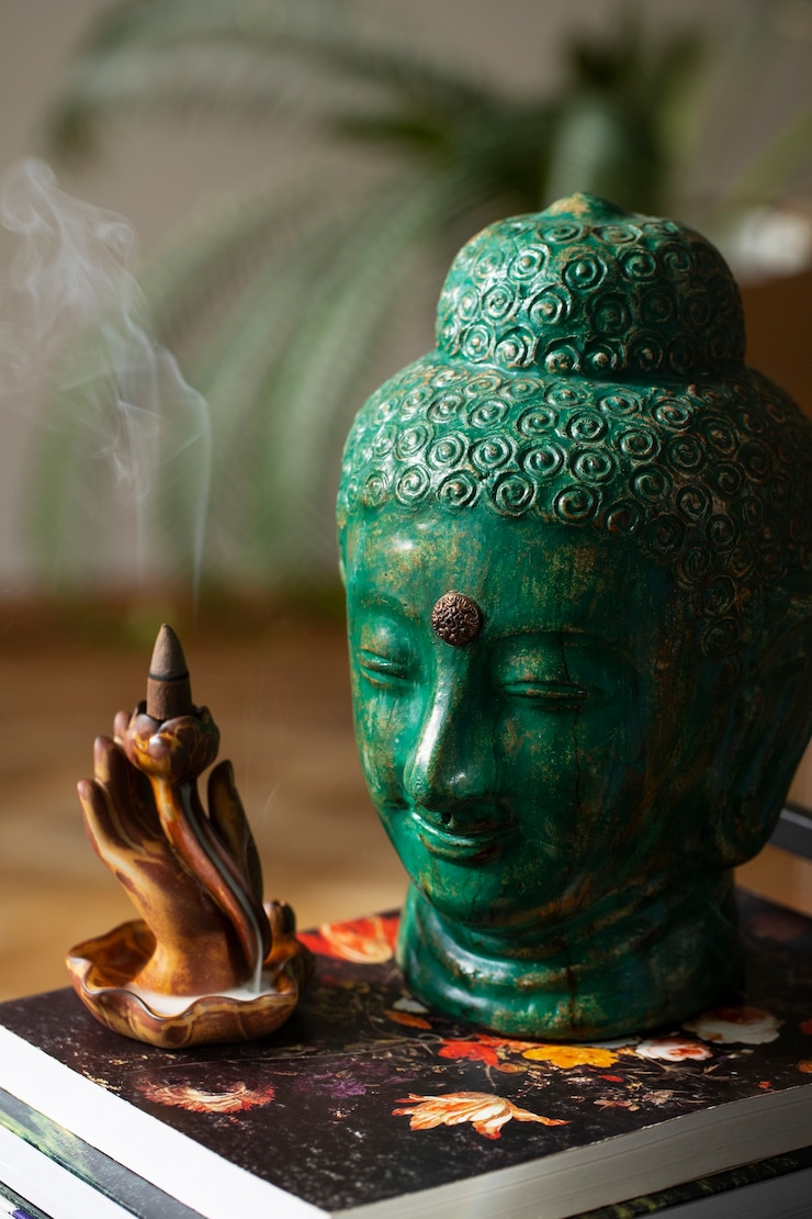 Foto grátis estátueta representando buda para tranquilidade e meditação