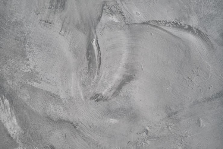 Foto grátis estucos com efeito de pedra cinzenta de alta resolução com fundo de concreto vista superior com espaço de cópia