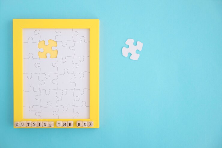 Foto grátis falta de quadro de quebra-cabeça branca sobre fundo azul