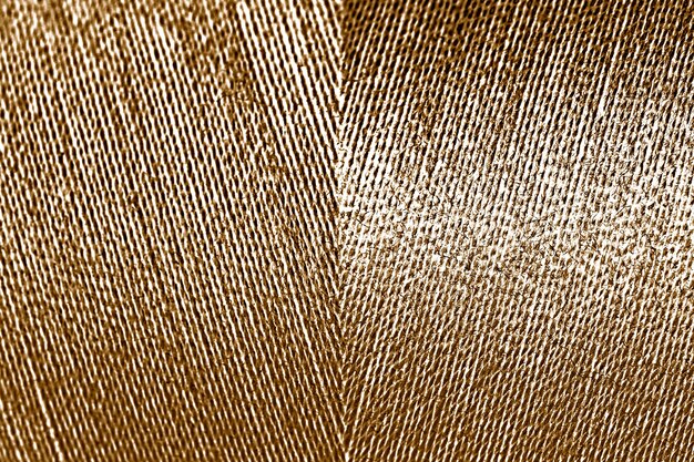 Foto grátis fio dourado brilhante com textura