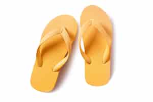 Foto grátis flip-flops par amarelo isolado no fundo branco
