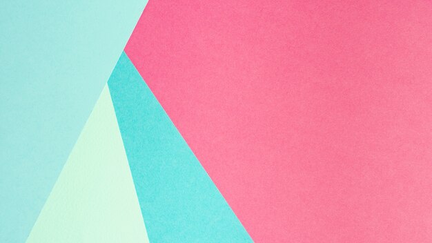 Folhas de papel azul e rosa com espaço de cópia