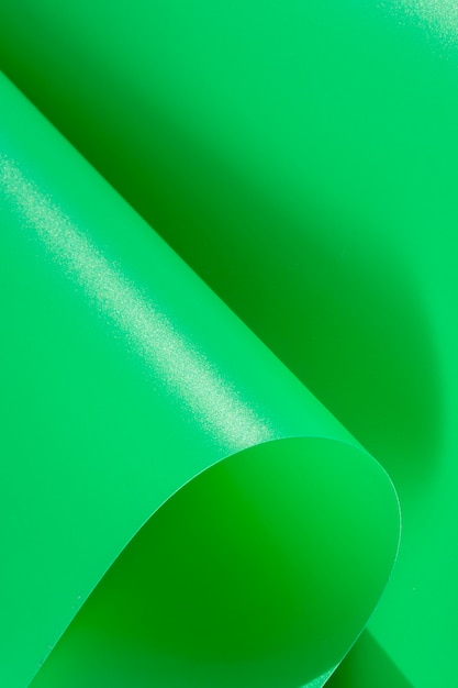 Folhas de papel curvas verdes