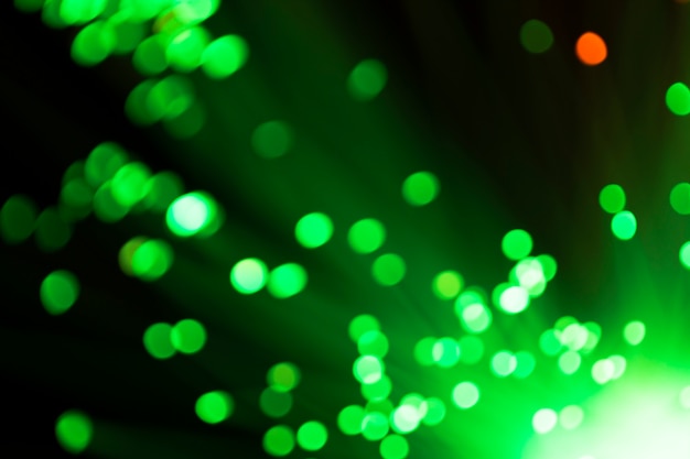 Fora de foco luzes de fibra óptica verde