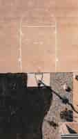 Foto grátis foto aérea de um campo de basquete de cimento com aro e pedras