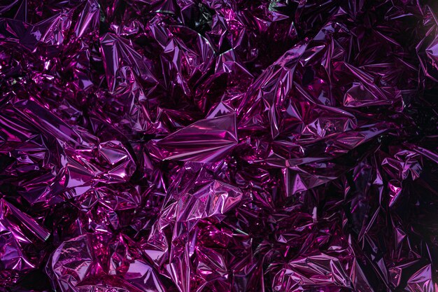 Fundo abstrato da textura do triângulo violeta