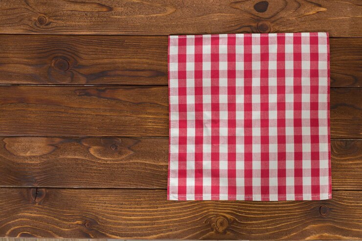 Foto grátis fundo com mesa de madeira vazia com toalha de mesa