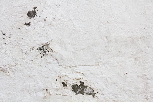Fundo da parede com pintura danificada