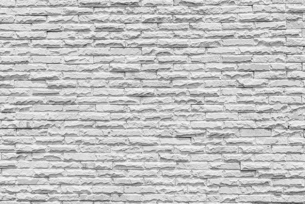 Fundo da parede de tijolo cinzenta