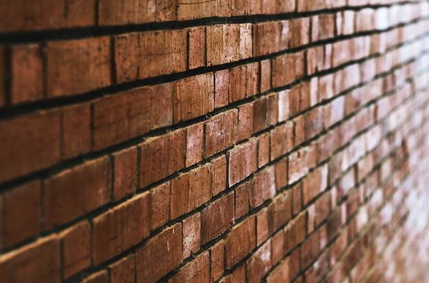Fundo da parede de tijolo vermelho marrom