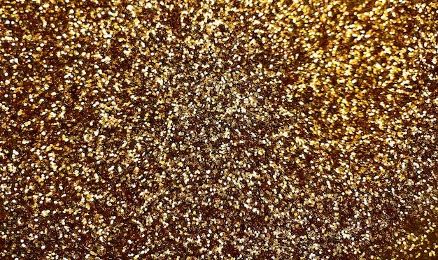 Foto grátis fundo de glitter dourado que é muito brilhante e tem muito glitter