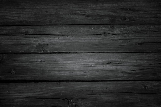 Foto grátis fundo de madeira preto rústico com espaço de cópia