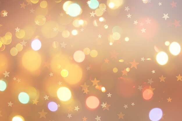 Fundo de Natal com estrelas e luzes bokeh