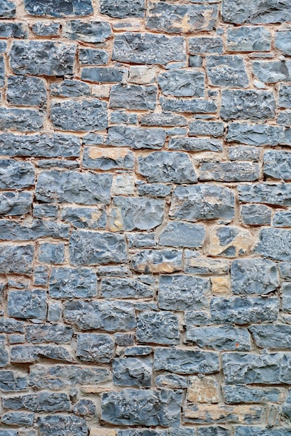 Fundo de parede de tijolos coloridos do antigo edifício na cidade de Quebec