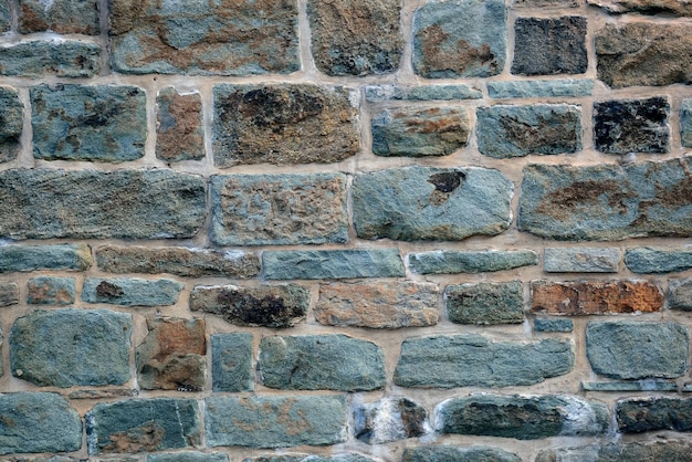Fundo de parede de tijolos coloridos do antigo edifício na cidade de Quebec