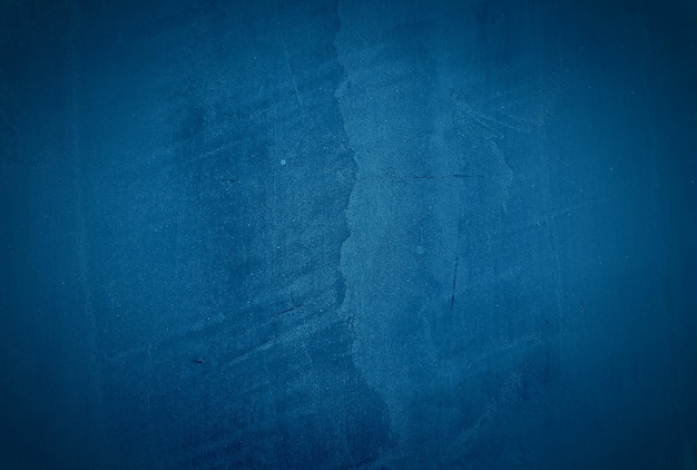 Fundo de parede do estúdio de textura de concreto azul vintage grunge com vinheta.