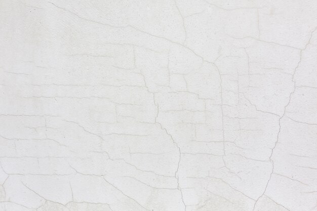 Fundo de textura de estuque de parede rachada branca