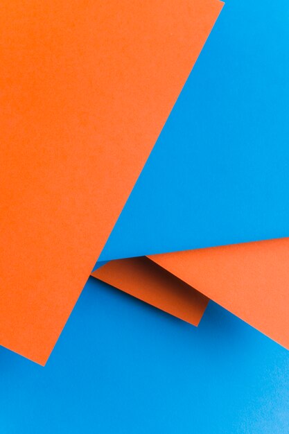 Fundo de textura de papel reciclado em azul e uma cor laranja