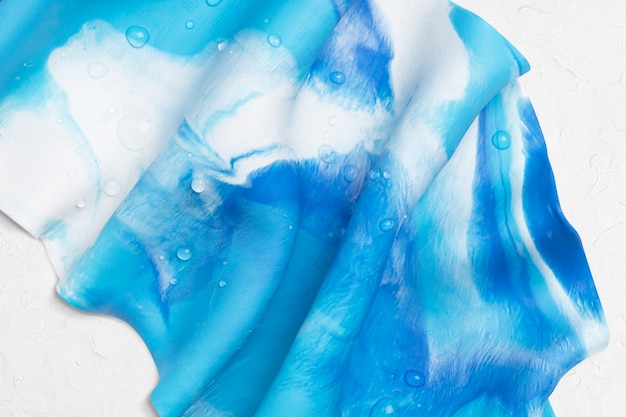 Fundo de tie-dye estético na arte criativa de argila de plasticina DIY azul