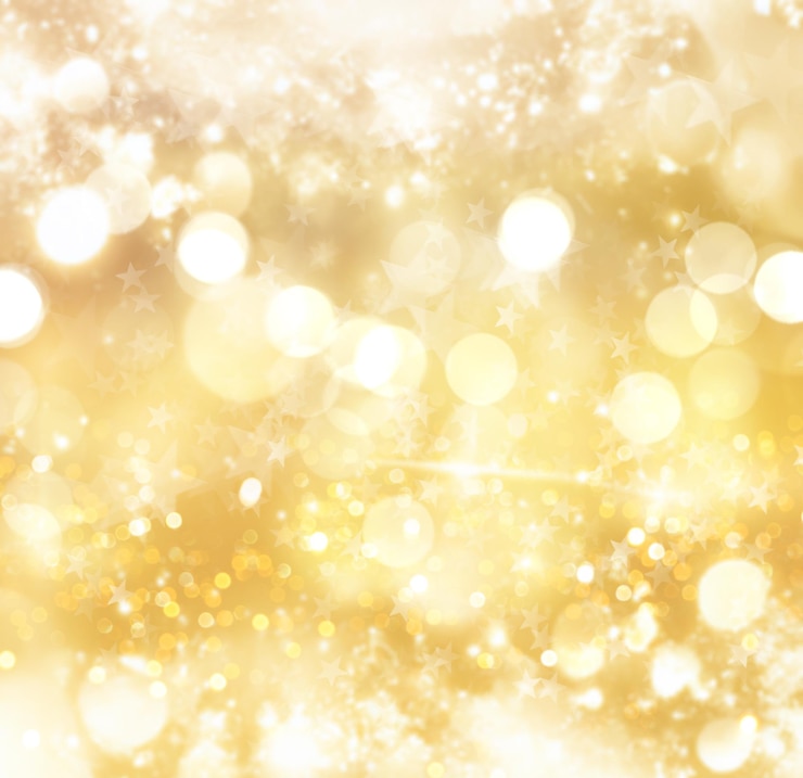 Foto grátis fundo dourado de natal de luzes e estrelas de bokeh