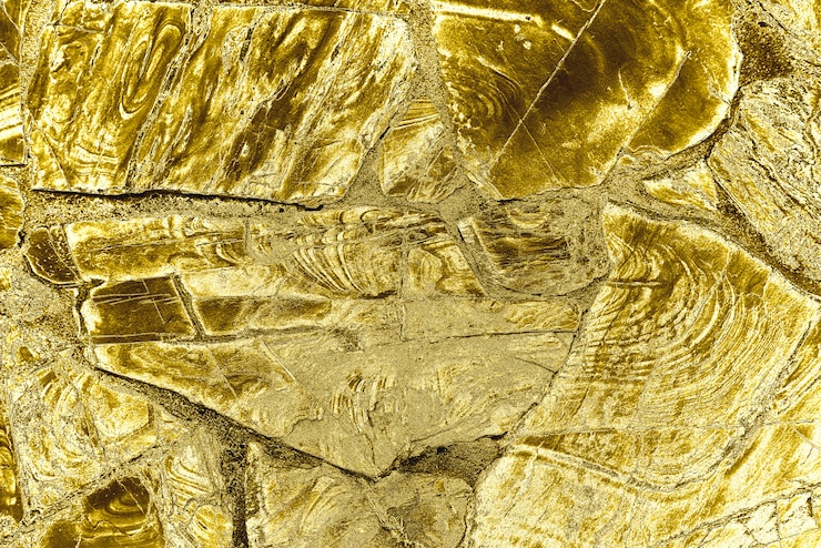 Foto grátis fundo dourado texturizado