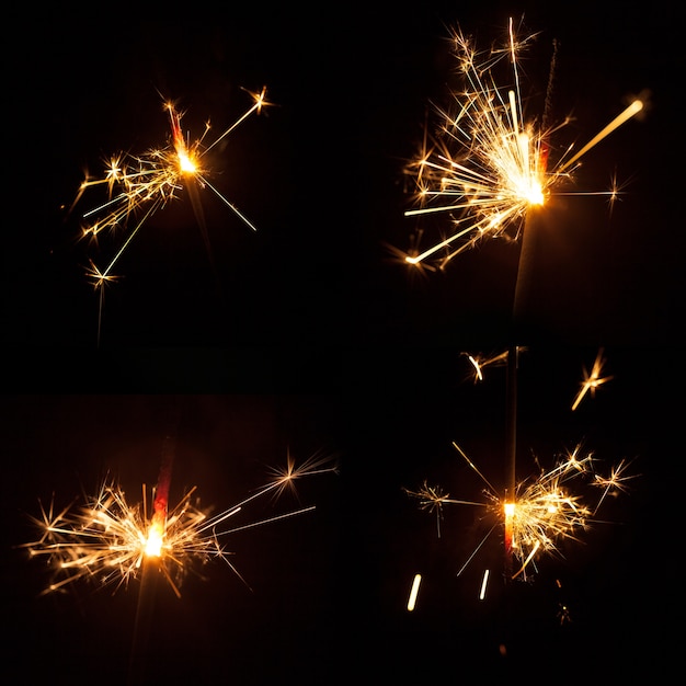 Foto grátis fundo escuro, quatro, brilhante, sparklers