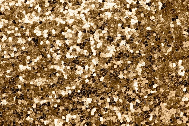 Foto grátis fundo metálico glitter dourados