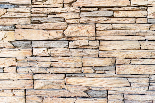 Foto de Empilhados Um Muro De Pedra Fundo Horizontal Pedra Branca De Fundo  De Parede Textura Tijolo Telha e mais fotos de stock de Amarelo - iStock