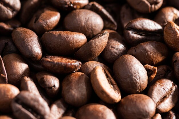 Fundo orgânico de grãos de café em close-up