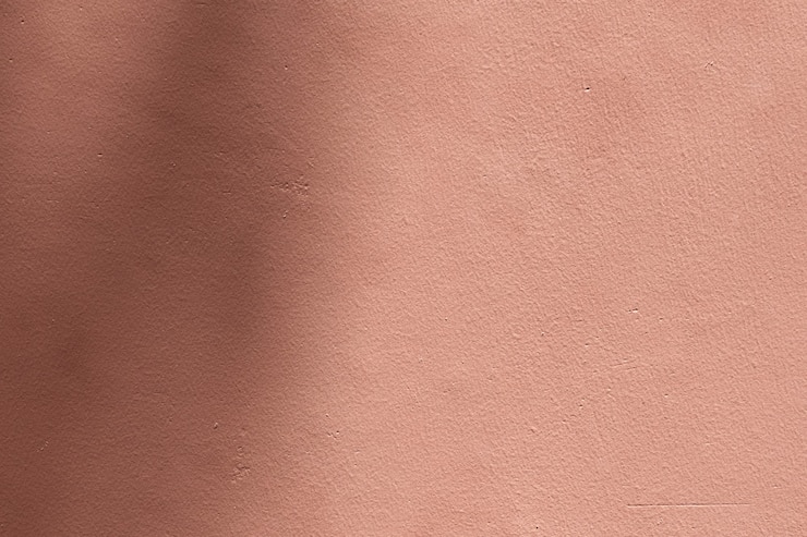 Foto grátis fundo rosa sombrio com textura de cimento