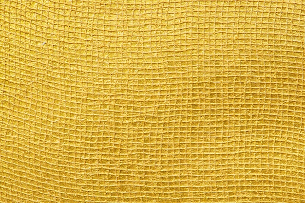 Foto grátis fundo texturizado superfície dourado brilhante