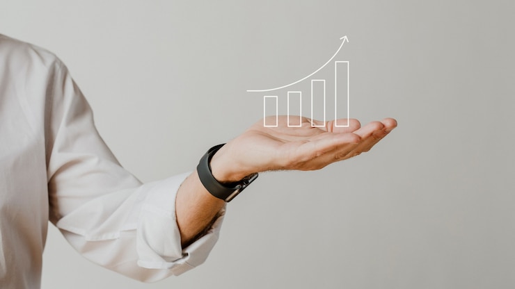 Foto grátis gráfico de barras crescente digital com sobreposição de mão de empresário