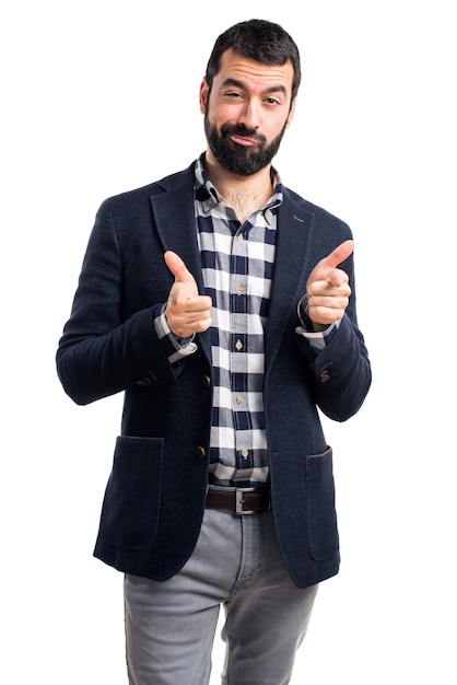 Foto grátis handsome homem apontando para a frente