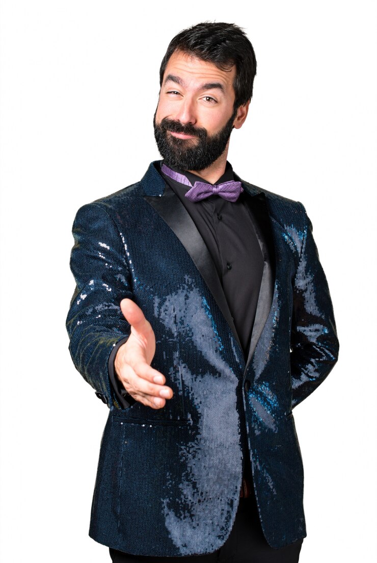 Foto grátis homem bonito com casaco de sequin fazendo um acordo