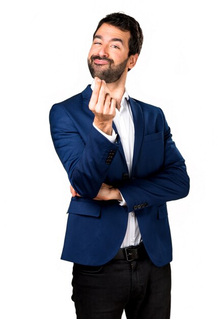 Homem bonito fazendo gesto de dinheiro